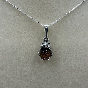 SOLDCute Little Silver and Flower Amber Hedgehog Pendant on Silver Chain
